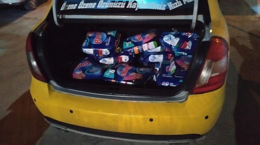 &Ccedil;aldığı deterjanları taksiyle taşırken yakalandı
