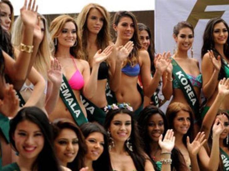 Miss Earth güzelleri yağmura yakalandı G1