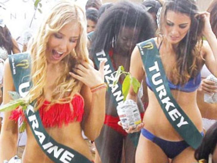 Miss Earth güzelleri yağmura yakalandı G2