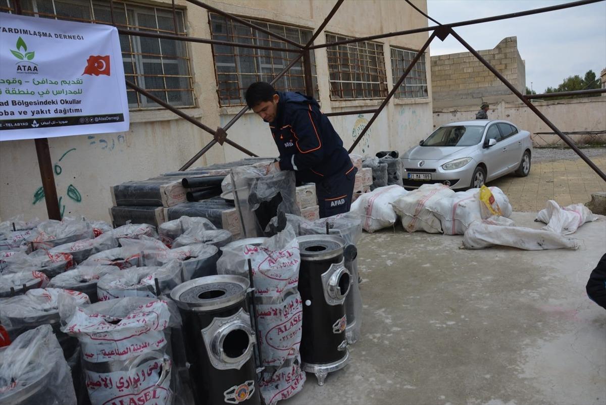 Tel Abyad ve Rasulayn'daki okullara soba ve yakacak desteği