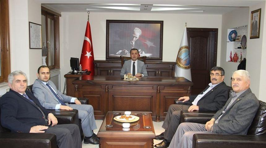 Dumlupınar protokol&uuml;nden Umre ziyaretinden d&ouml;nen Altıntaş Kaymakamına ziyaret