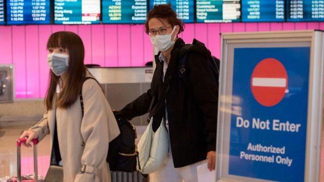 Çinli yetkililer, Vuhan havalimanında uçuşları geçici süreyle askıya aldı.