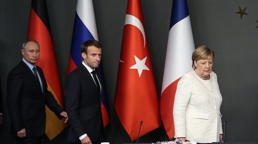 Son dakika! Merkel ve Macron'dan Rusya'ya İdlib &ccedil;ağrısı
