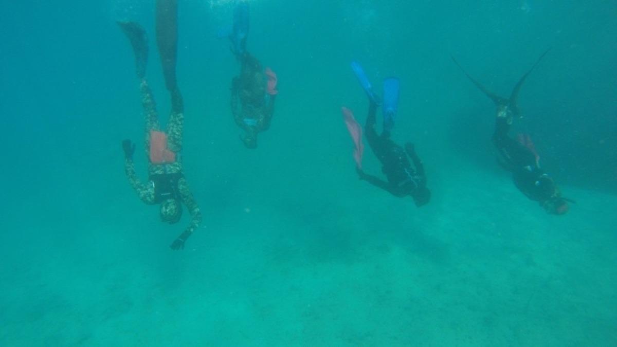 Uluslararası Optimist Yarışları &ouml;ncesi deniz dibi temizliği yapıldı