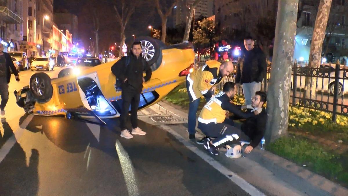 Şişli'de &ouml;n&uuml;ndeki taksiye &ccedil;arpan taksi takla attı: 2 yaralı&nbsp;