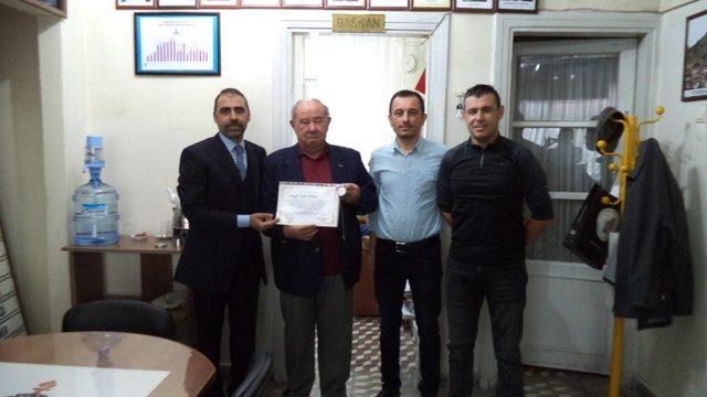 Şakar’a onur belgesi