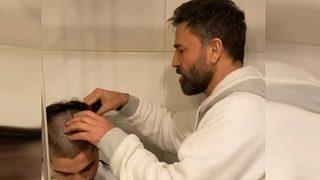 Berberler kapanınca İzzet Yıldızhan oğlunu tıraş etti