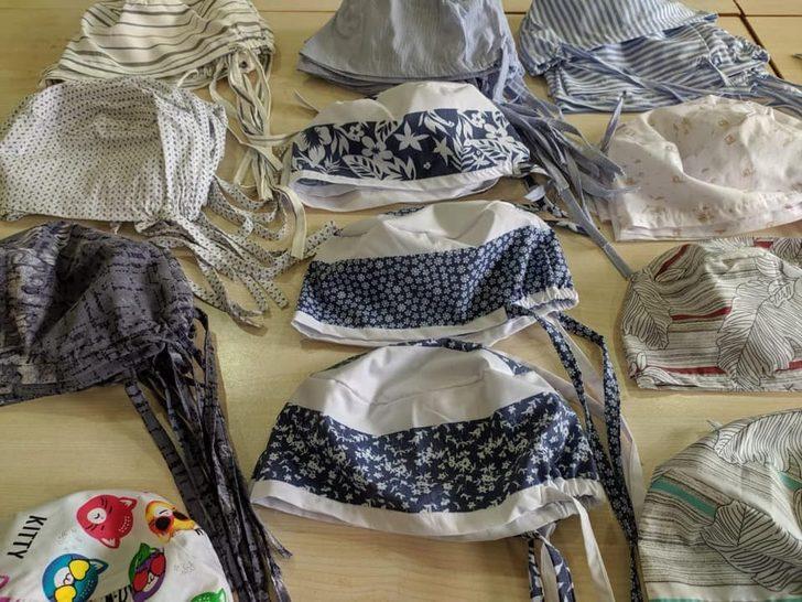 Küçük bir atölyede yüzlerce maske ve bone diktiler G4