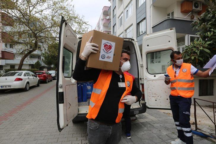 İhtiyaç sahiplerine gıda ve hijyen paketleri dağıtılıyor G1