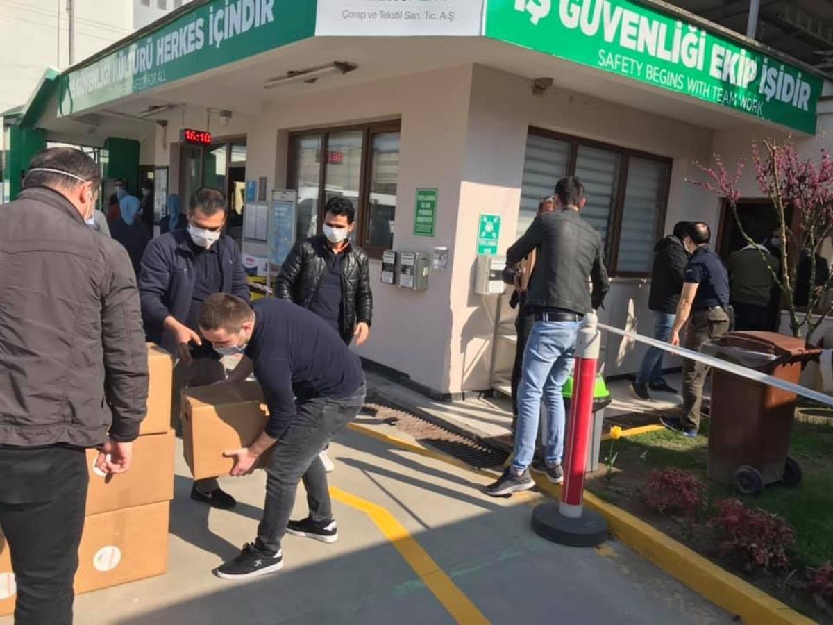 D&uuml;zce İş&ccedil;ilerine koli yardımı