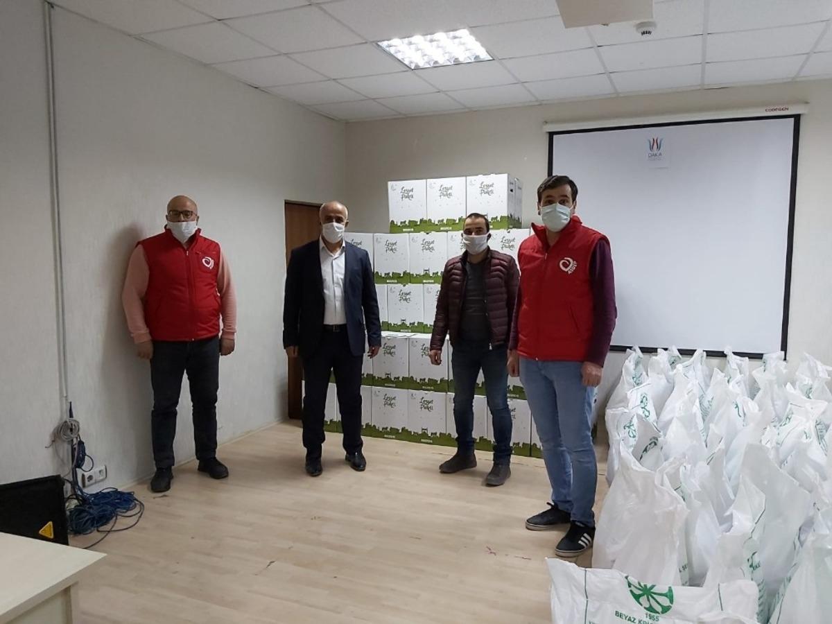 &Ccedil;aldıranlı esnaftan ihtiya&ccedil; sahibi ailelere 250 koli gıda desteği