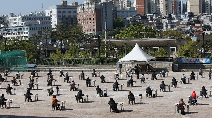 Güney Kore’de koronavirüse karşı açık havada sınav G1