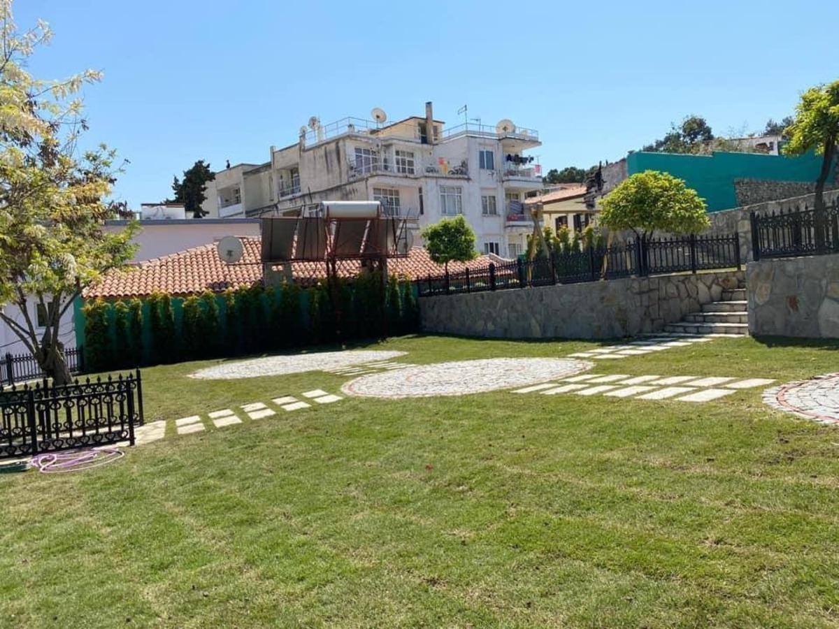 &Uuml;nl&uuml; Yazar Muzaffer İzg&uuml;&rsquo;n&uuml;n ismi Kuşadası&rsquo;nda yaşayacak