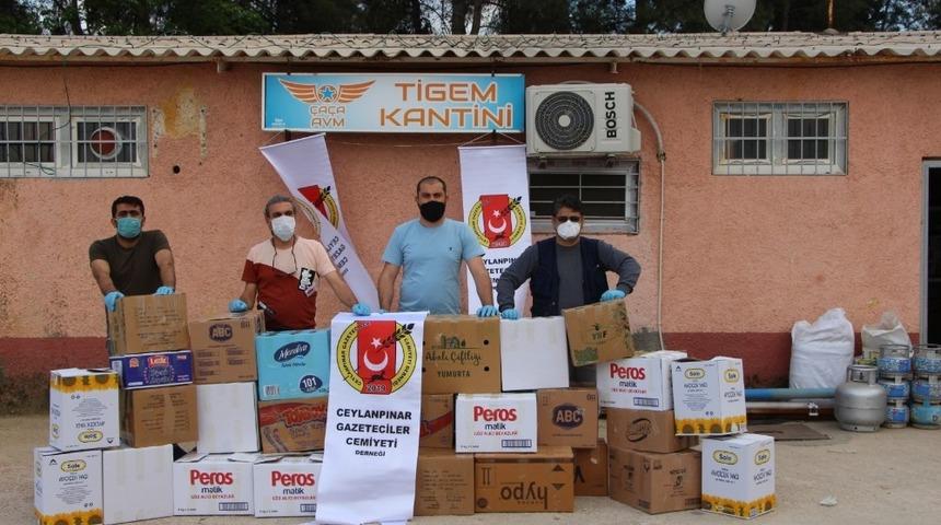 Gazetecilerden 37 aileye gıda yardımı