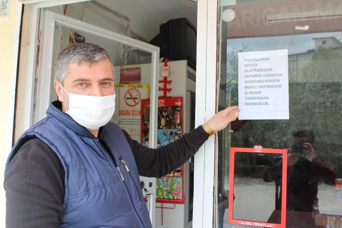 Gizli hayırsever bakkala girdi, 10 bin TL&rsquo;lik borcu kapattı
