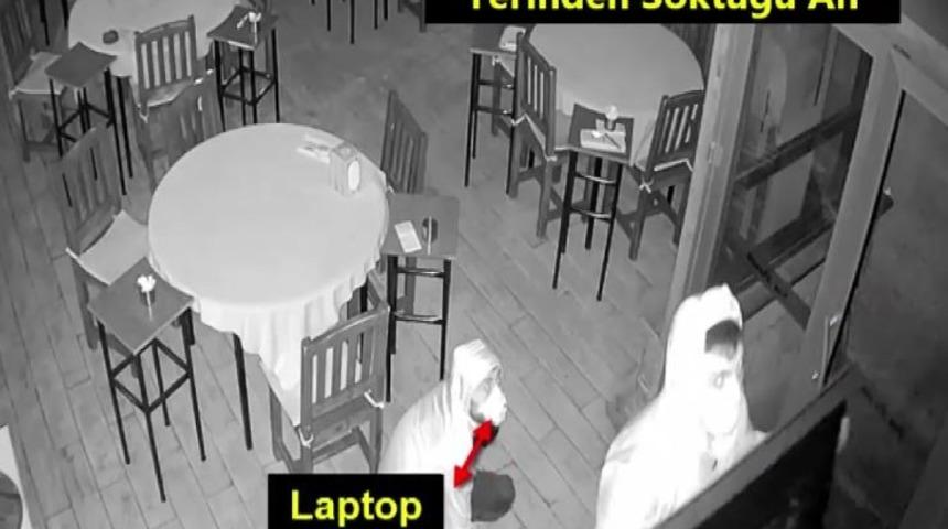 Cerrahi maskeli televizyon hırsızları g&uuml;venlik kamerasında