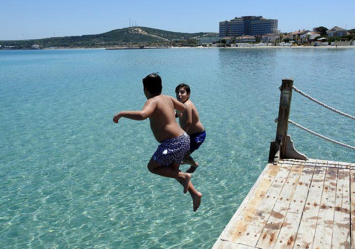 Ünlü tatil merkezinde plajlar tıklım tıklım doldu G3