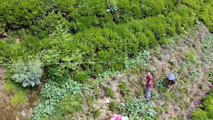 Rizeli muhtardan koronavirüs önlemi! Drone'a çanta takıp maske dağıttı G1