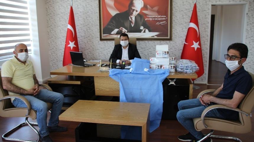 Varto Belediyesine tulum ve maske desteği