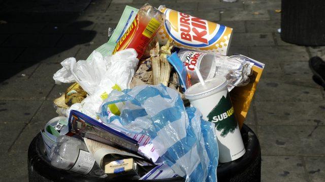 Rubbish overflowing from a bin