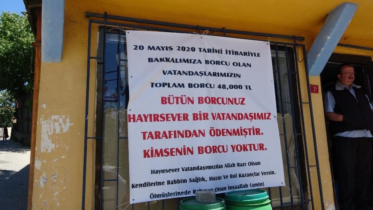 Gizemli hayırsever kadın mahallelinin 20 yıllık veresiye borcunu kapattı! Bakkal isyan etti