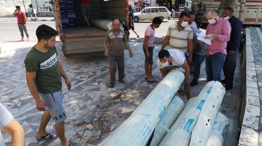 Afette zarar g&ouml;ren &uuml;reticiye sera naylonu desteği