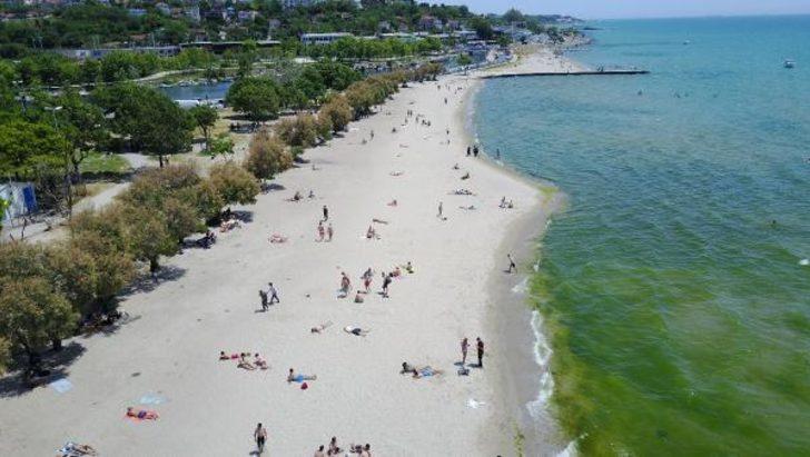 İstanbul'da plaja akın ettiler: Kum bizi korur G4