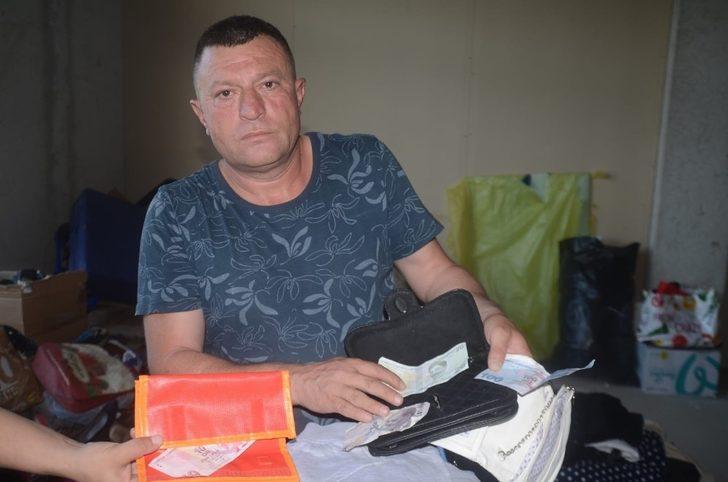 Yardım kolilerinin içinden çıkan para duygulandırdı G1