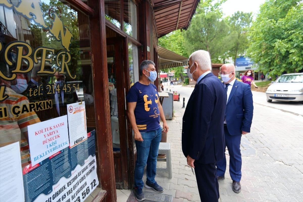 İki başkandan esnaf ziyareti