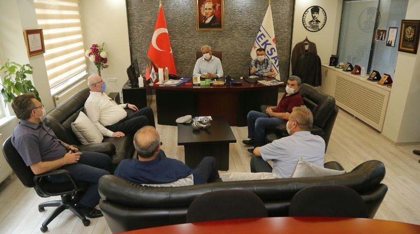 Başkan Kurt’tan Teksan esnafına geçmiş olsun ziyareti