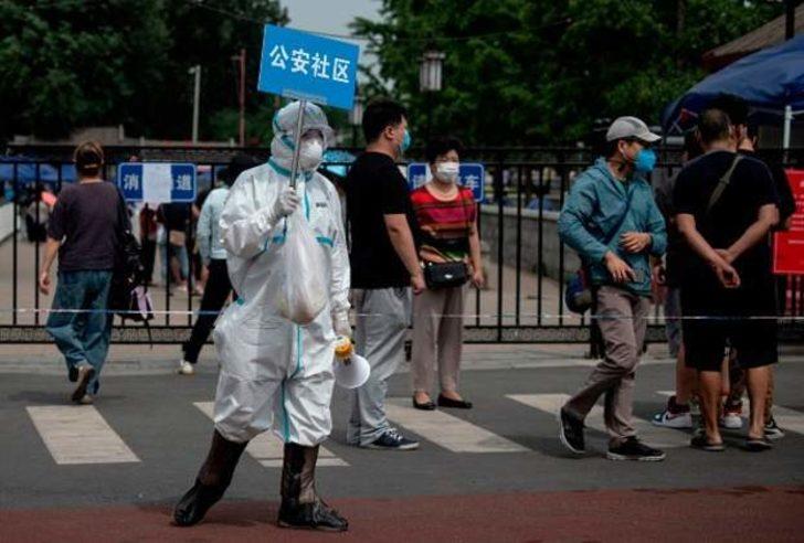 Uzmanlar, Pekin'deki salgında farklı Kovid-19 semptomları görüyor
