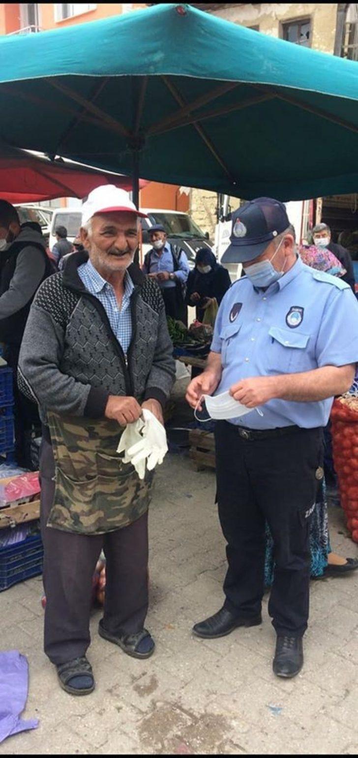 Dumlupınar pazarında eldiven ve maske dağıtıldı G1