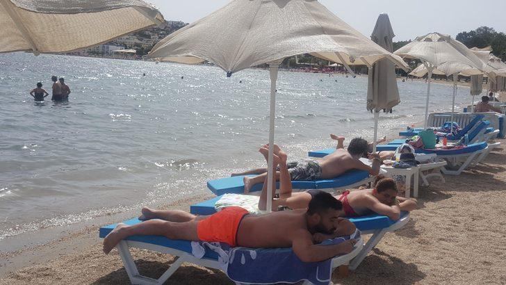 Bodrum'da sahiller hareketlendi! Plajlar sosyal mesafeye göre düzenlendi ama... G1