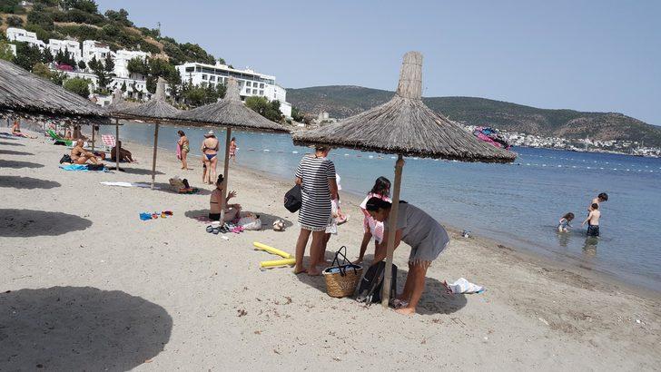 Bodrum'da sahiller hareketlendi! Plajlar sosyal mesafeye göre düzenlendi ama... G5
