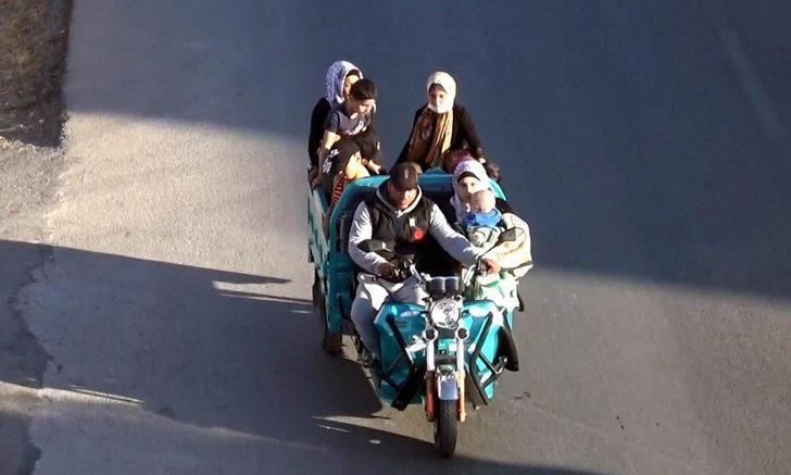 10 kişilik ailesini bir motosiklete bindirdi G2