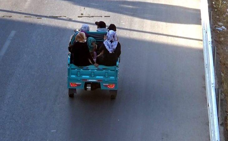 10 kişilik ailesini bir motosiklete bindirdi G3