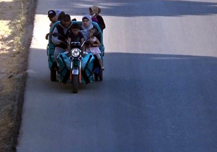 10 kişilik ailesini bir motosiklete bindirdi G4