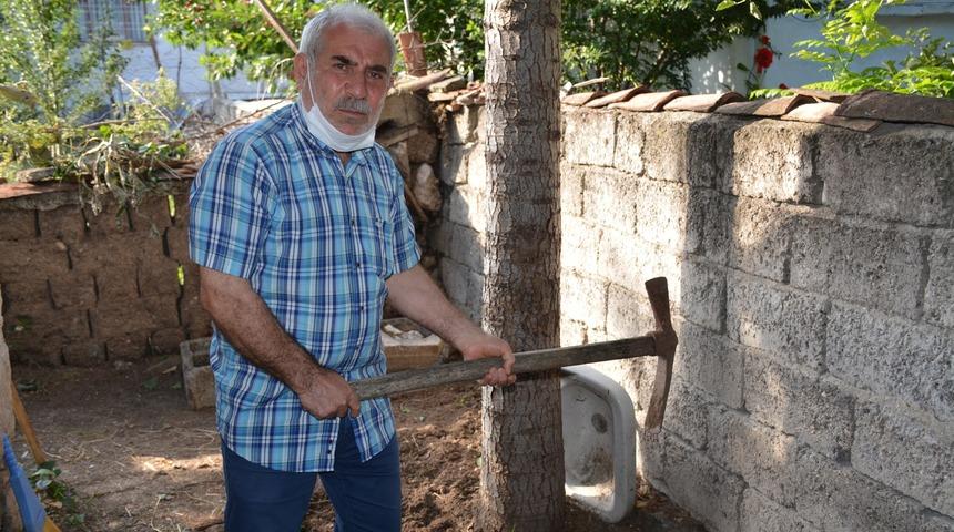 Fide dikmek istediği bahçesinde 'el bombası' buldu