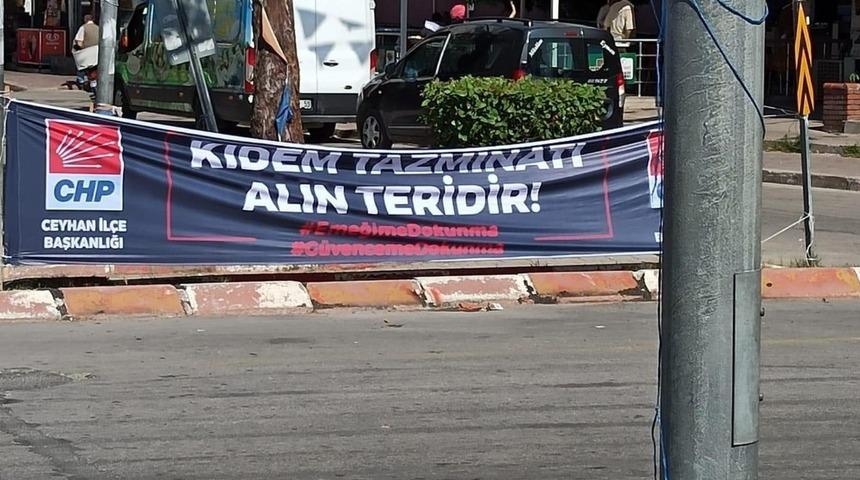 Bünül’den CHP’nin pankartına tepki