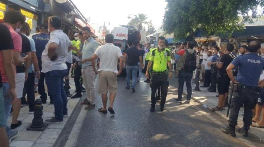 Bodrum'da &uuml;nl&uuml; markaların avukatları ile imitasyon &uuml;r&uuml;n satan esnaf arasında gerginlik