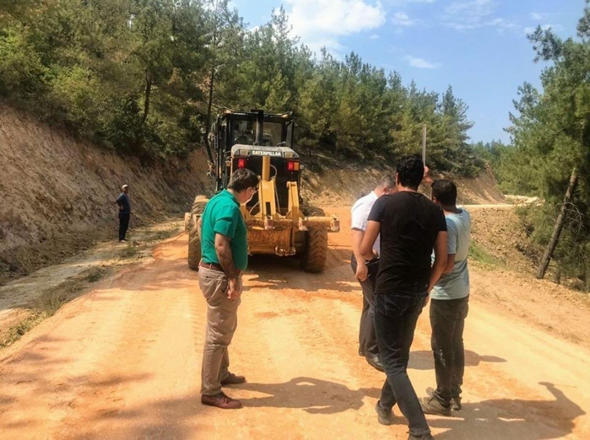 Kaymakam Yavuz, yapımı devam eden k&ouml;y yolunda incelemede bulundu