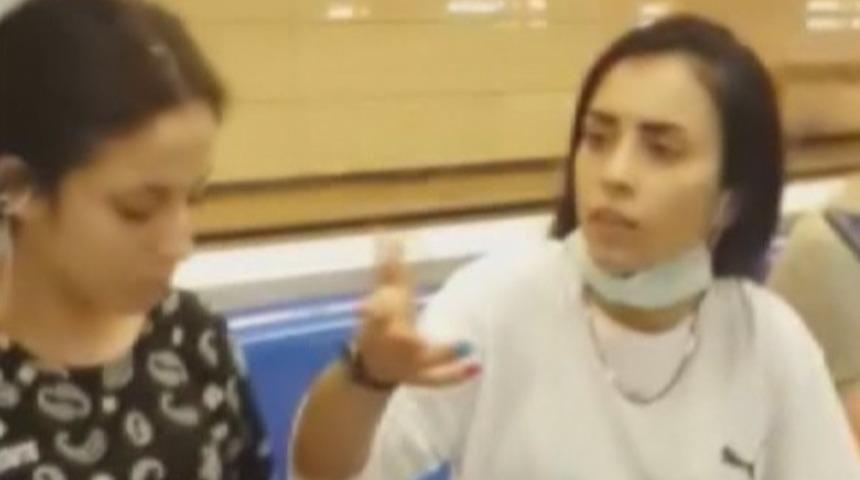 Metroda maske takmama kavgası