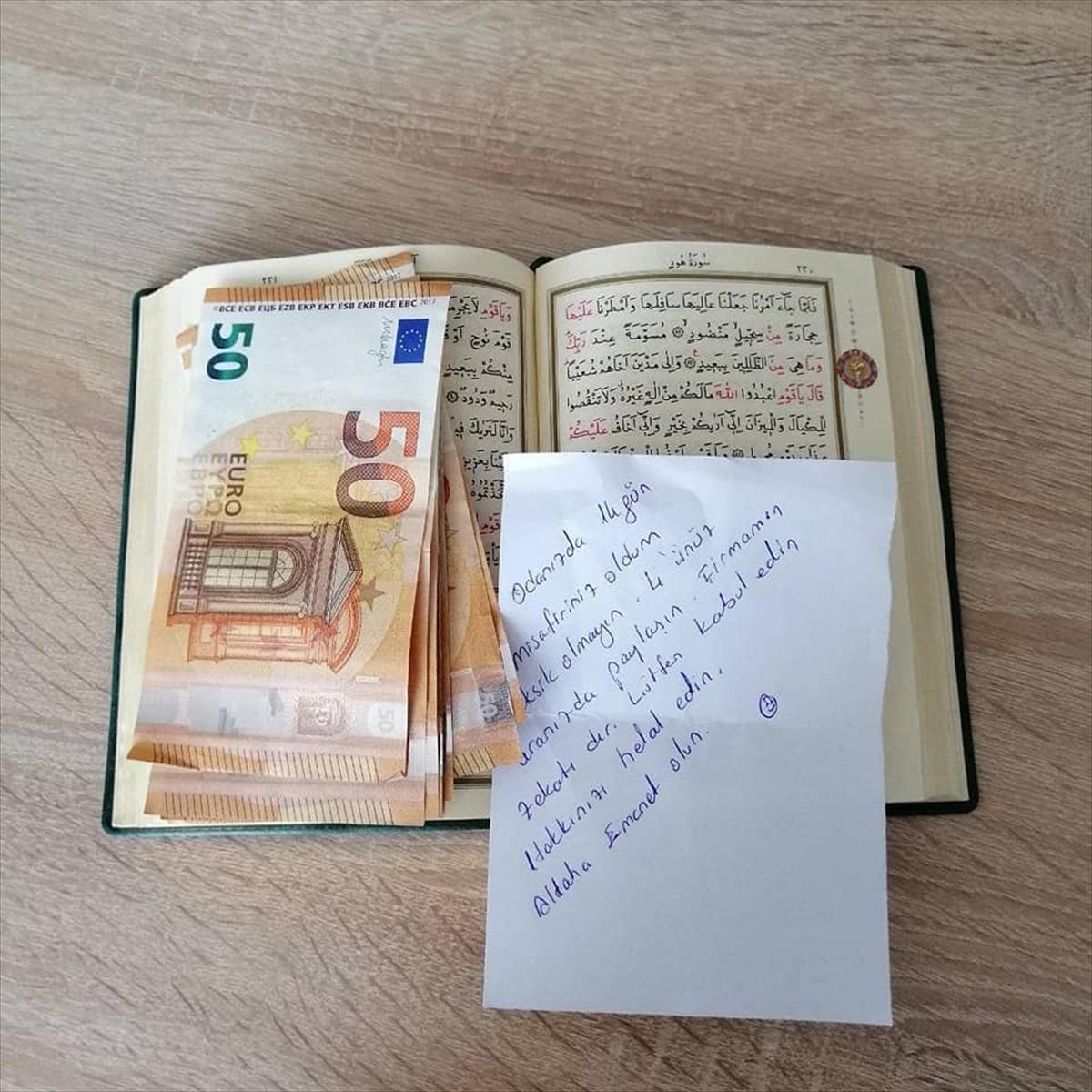 Karantinada kaldığı yurt odasındaki Kur'an-ı Kerim'in arasına 400 avro bıraktı