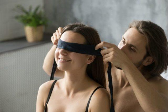 0_Young-man-blindfolding-smiling-woman-during-foreplay-sex-play-c