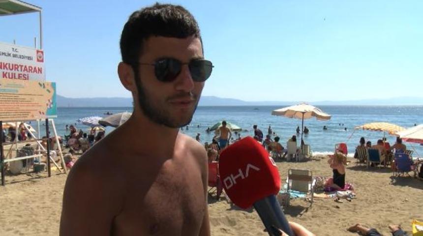 Bursa'daki Kumla Sahili&rsquo;nde kurallara uyan yok! 'Vir&uuml;s olsaydı ilk &ouml;nce bana bulaşırdı'