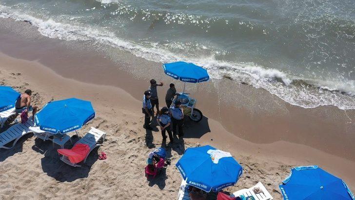 Kuşadası Belediyesi zabıtası Kuşadası Körfezindeki sahilleri drone ile denetliyor G5