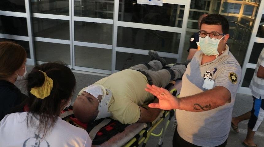 Adana'da ters rüzgara kapılan paraşütçü boş araziye düştü