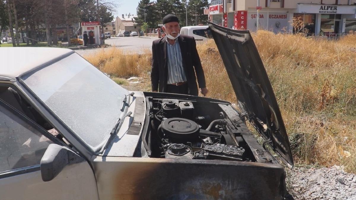 Aracı yanan yaslı adamın imdadına &ccedil;evredeki vatandaşlar yetişti