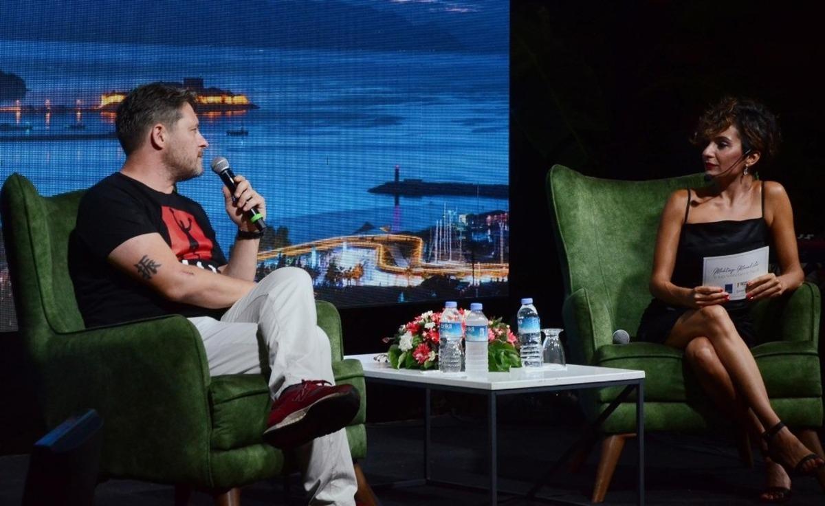 Kuşadası &uuml;nl&uuml; m&uuml;zisyen ve yazar Tuna Kiremit&ccedil;i&rsquo;yi ağırladı