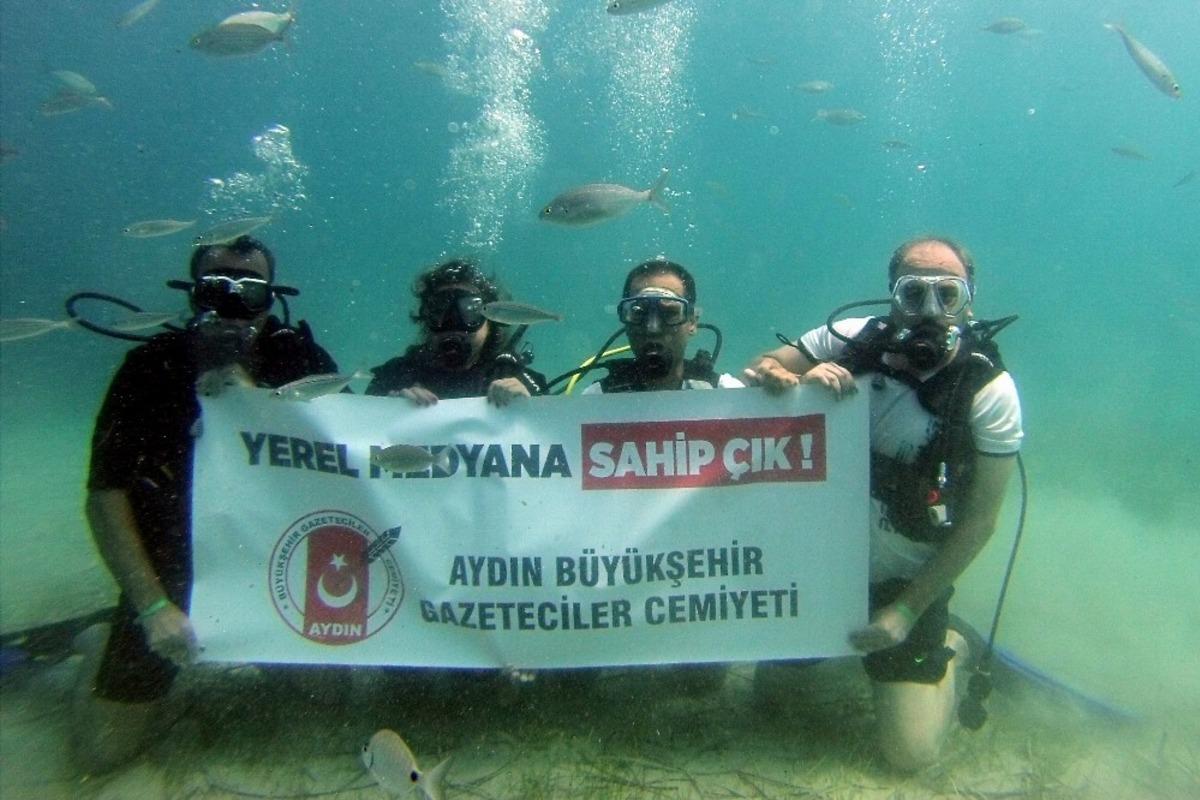 Aydınlı gazeteciler seslerini suyun altından duyurmaya &ccedil;alıştı